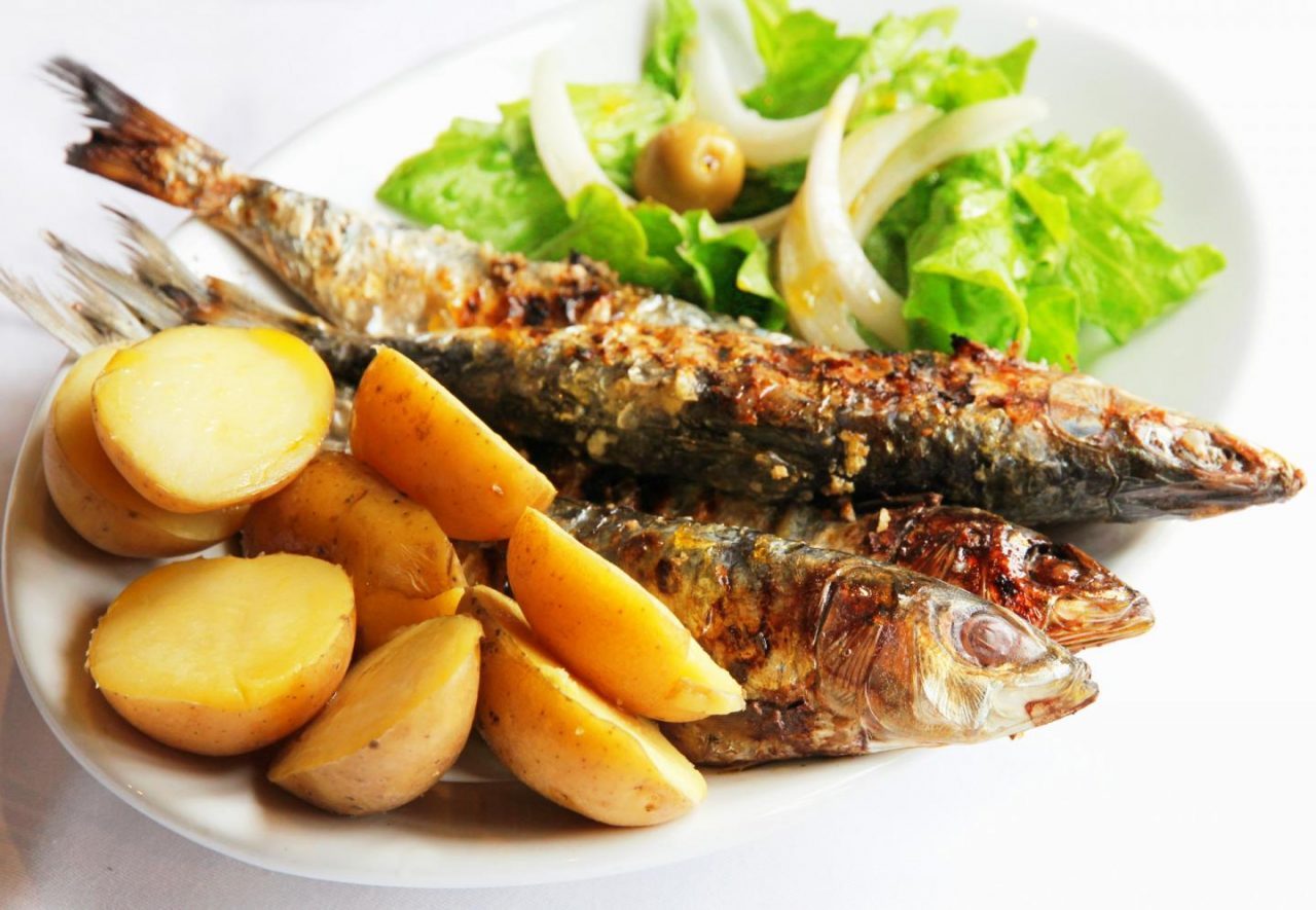 grilled sardines traditional portuguese dish Lisbon City Guide