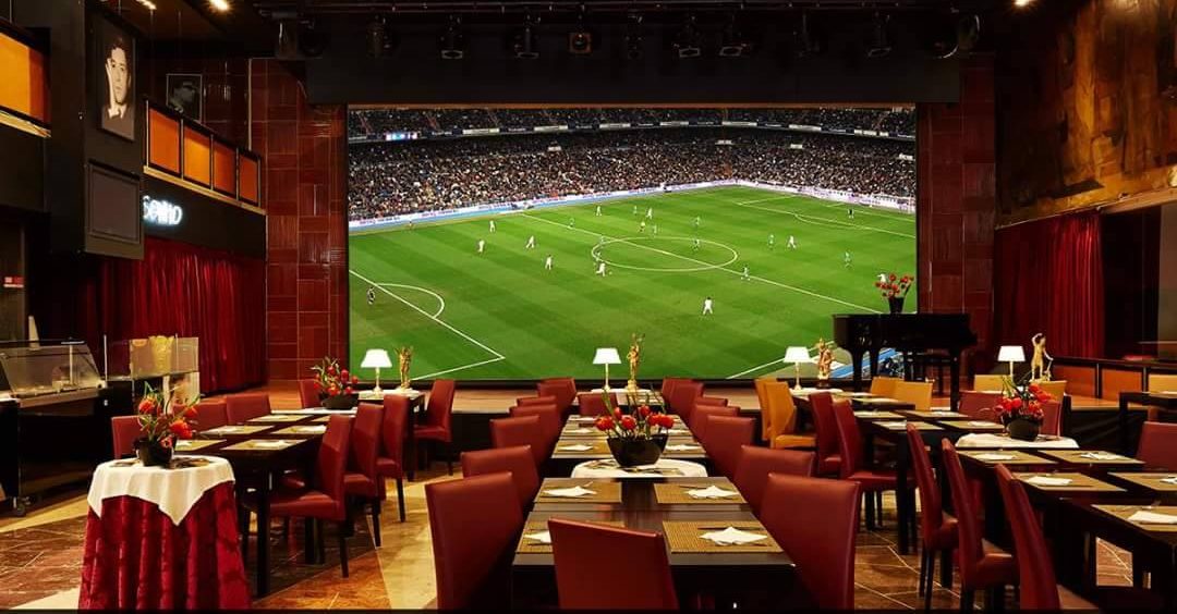 Main room with giant screen of Cafe Imperio Sports Bar in Lisbon